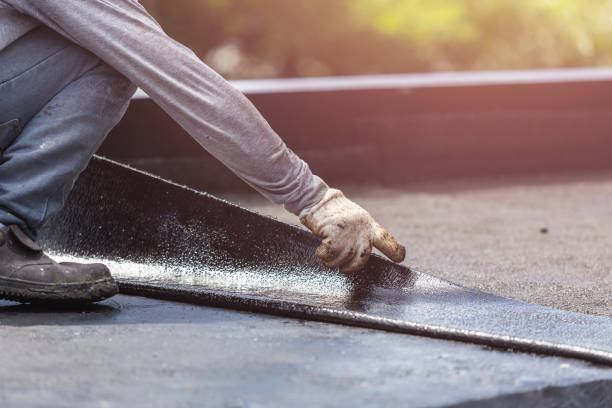 Professional Basement Waterproofing technician working in Ellenwood, GA